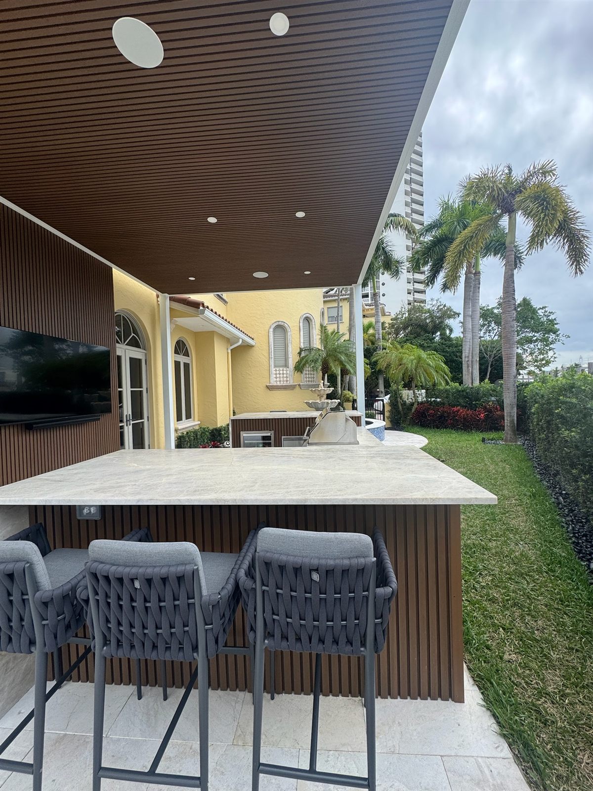 Bar with lush landscaping alongside
